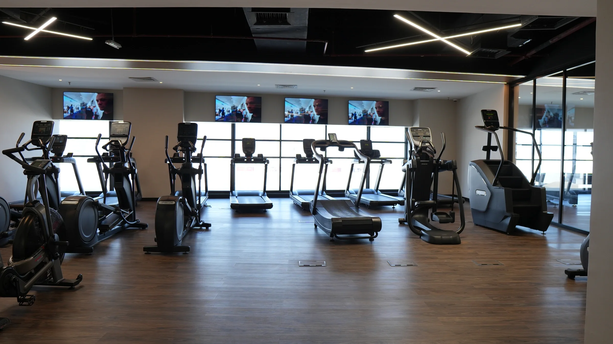 The window-facing cardio area